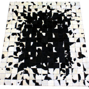 tapis patchwork design vache noir et blanc