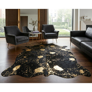 tapis peau de vache noir or