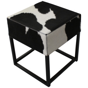 Tabouret en peau de vache noir et blanc