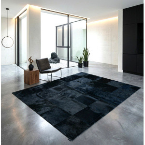 tapis noir en cuir maison tergus