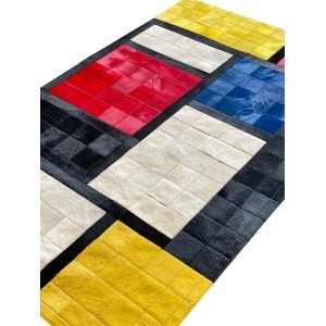 zoom matiere tapis vache patchwork mondrian