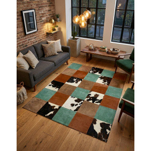 tapis peau de vache automne maison tergus